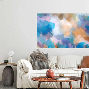 Living room with a white sofa, decorative pillows, and a colorful abstract painting on the wall.