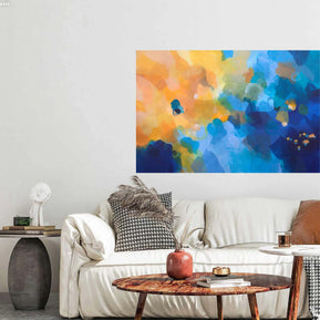 Colorful abstract painting on a wall above a white sofa with decorative pillows.