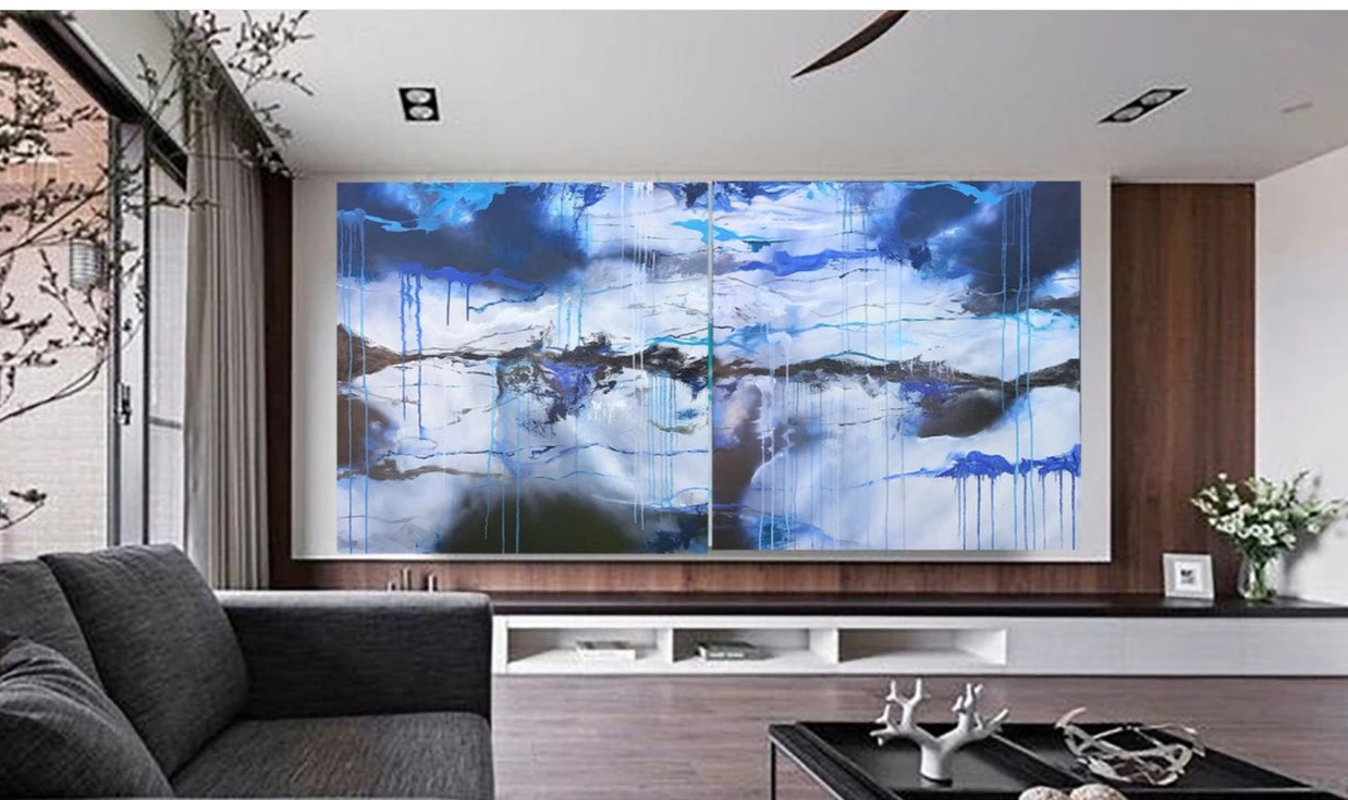 Modern living room with a large abstract painting on the wall.