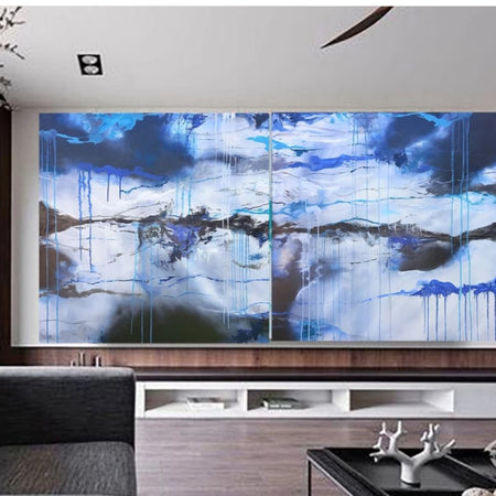 Modern living room with a large abstract painting on the wall.