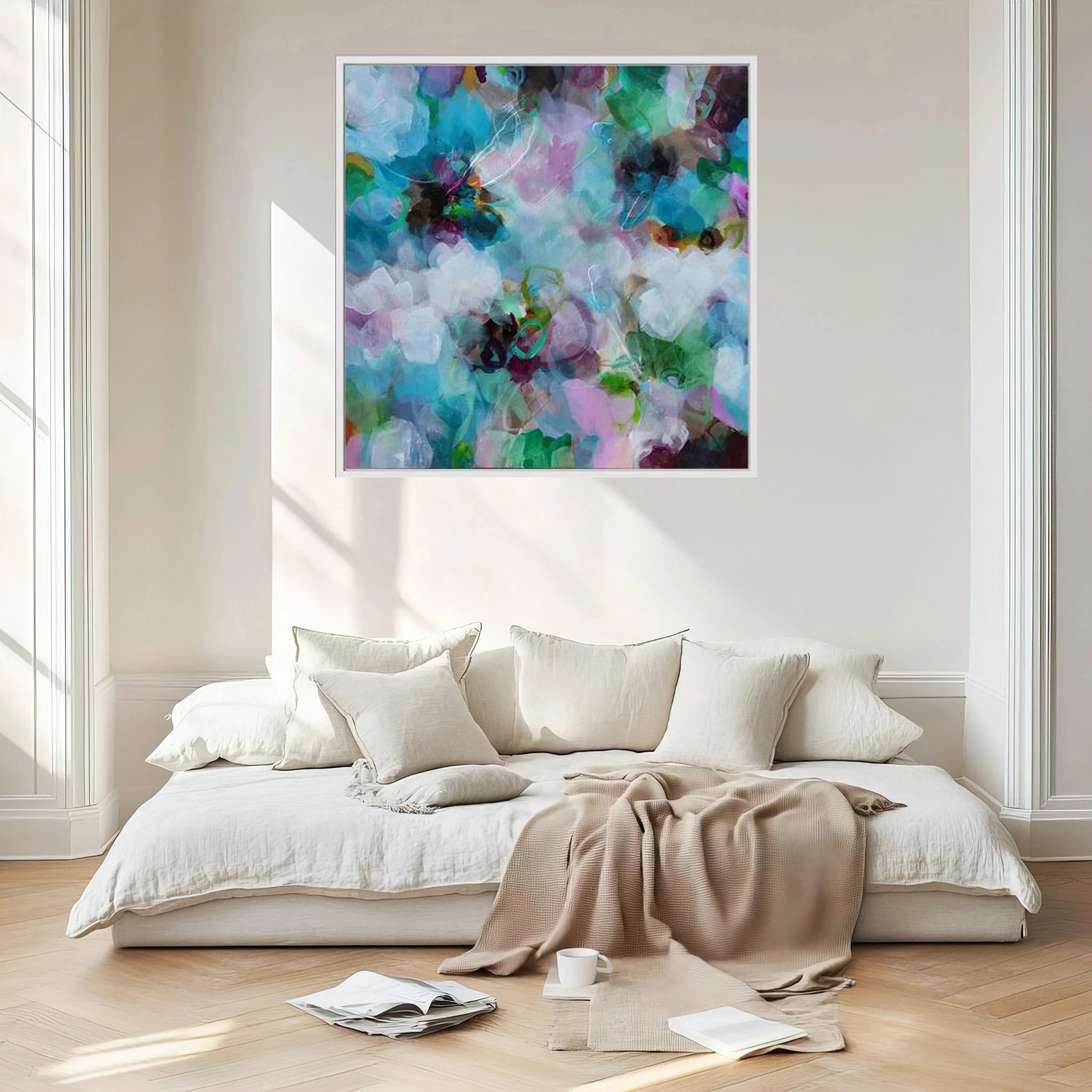 Modern bedroom with a bed, abstract painting on the wall, and minimal decor.