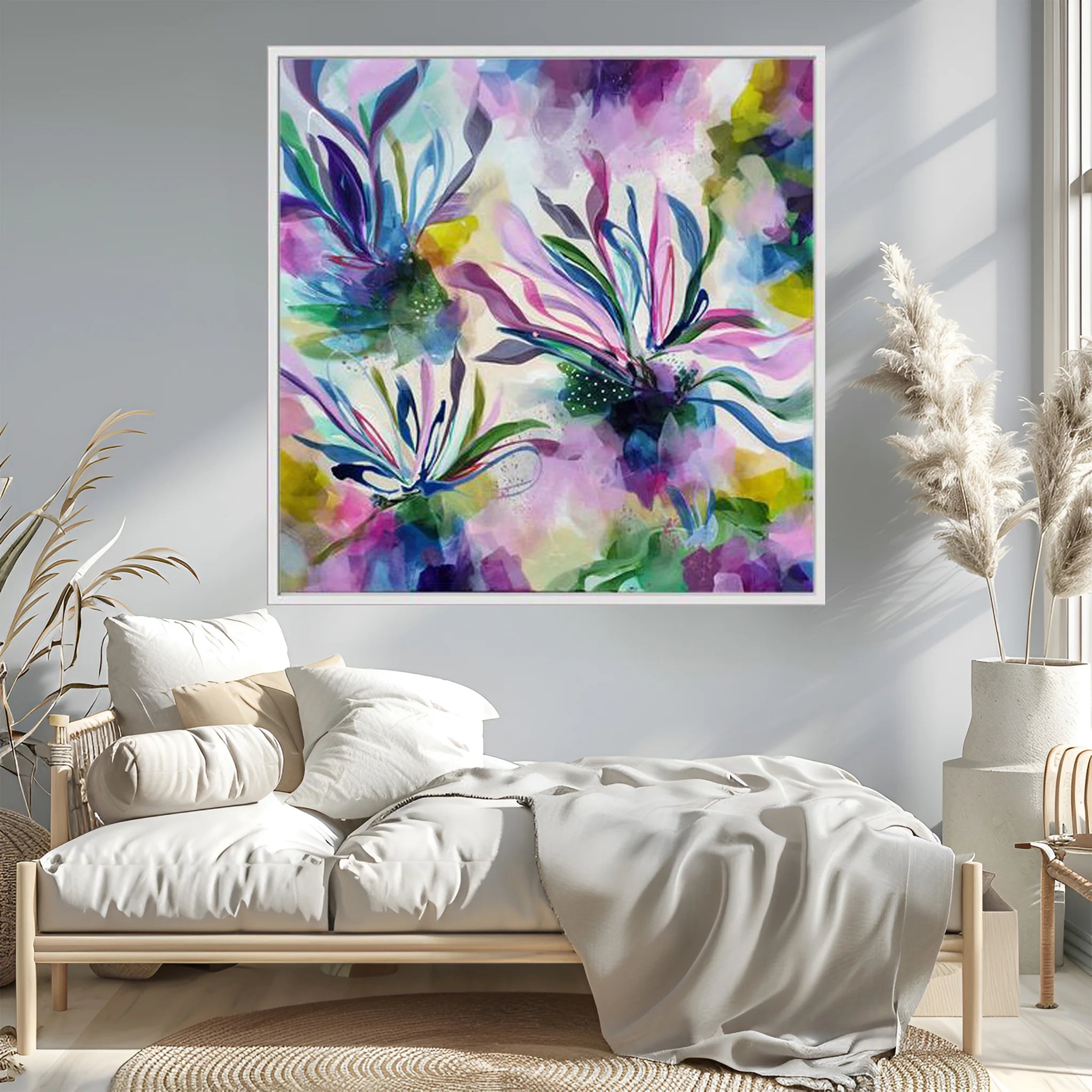 Colorful abstract floral painting on a wall above a bed in a bedroom.