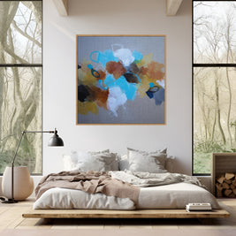 Modern bedroom with abstract art on the wall, large windows, and natural light.