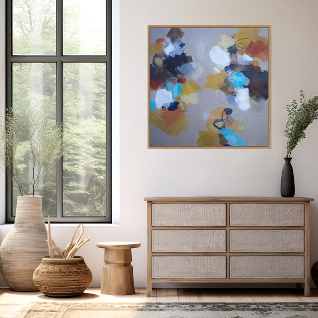 Modern interior with a dresser, abstract painting, and decorative vases.