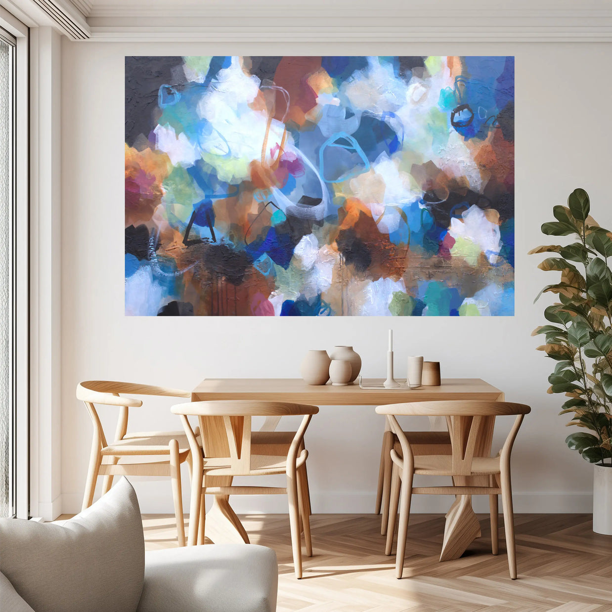 Dining room with a colorful abstract painting on the wall