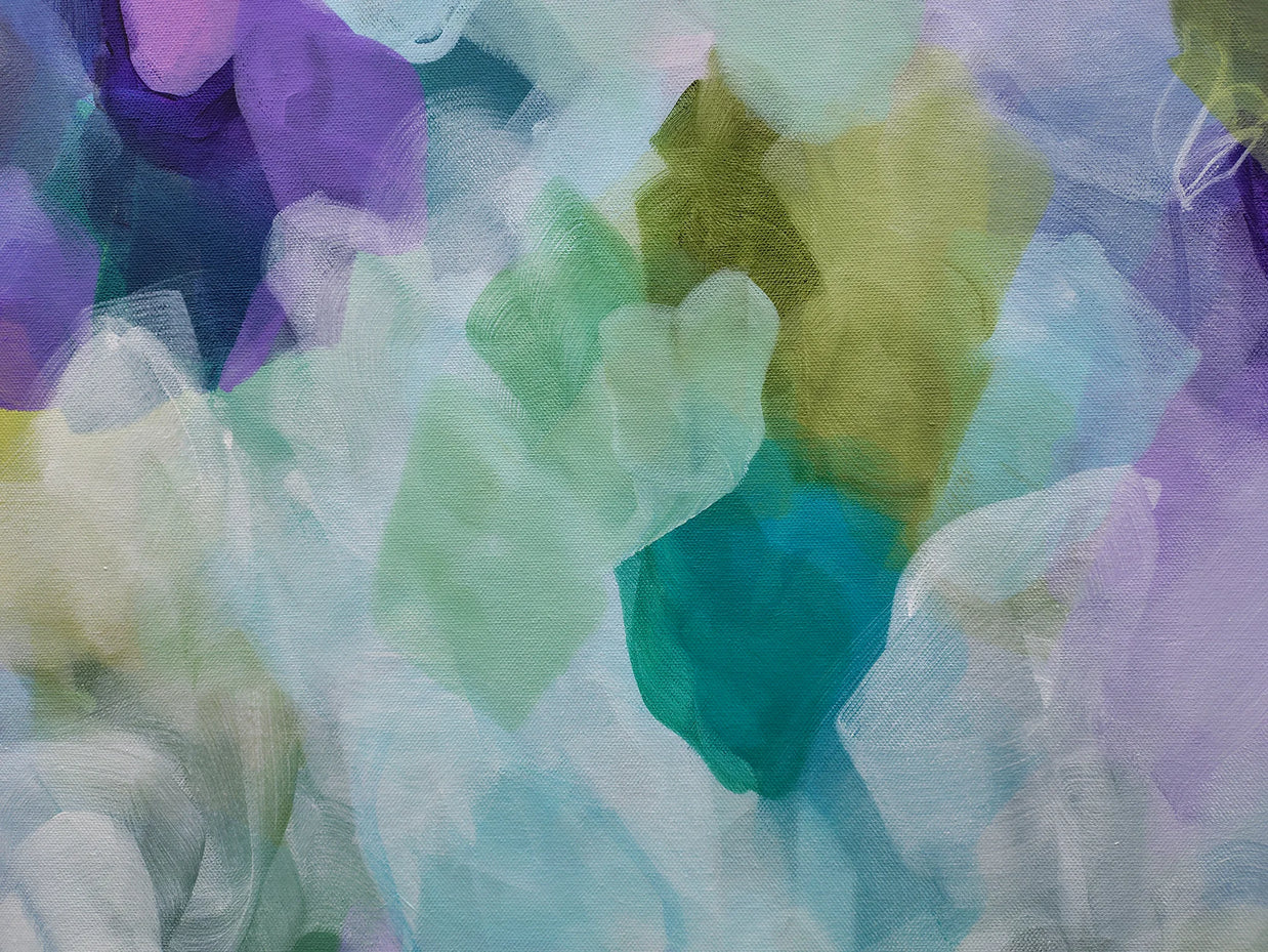 Colorful abstract pattern with shades of green, blue, purple, and yellow.