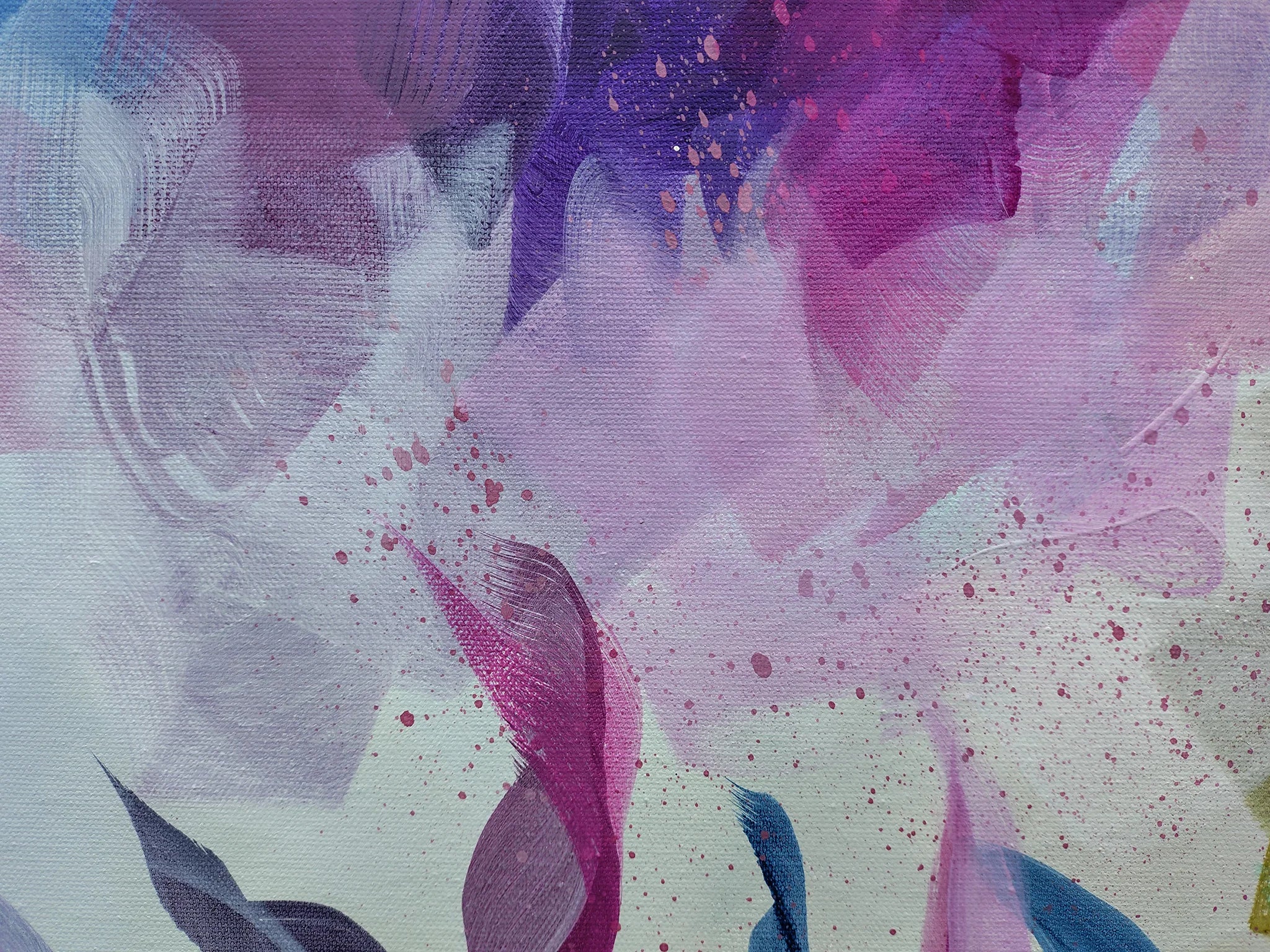 Abstract art with pink, purple, and blue colors on a textured surface.