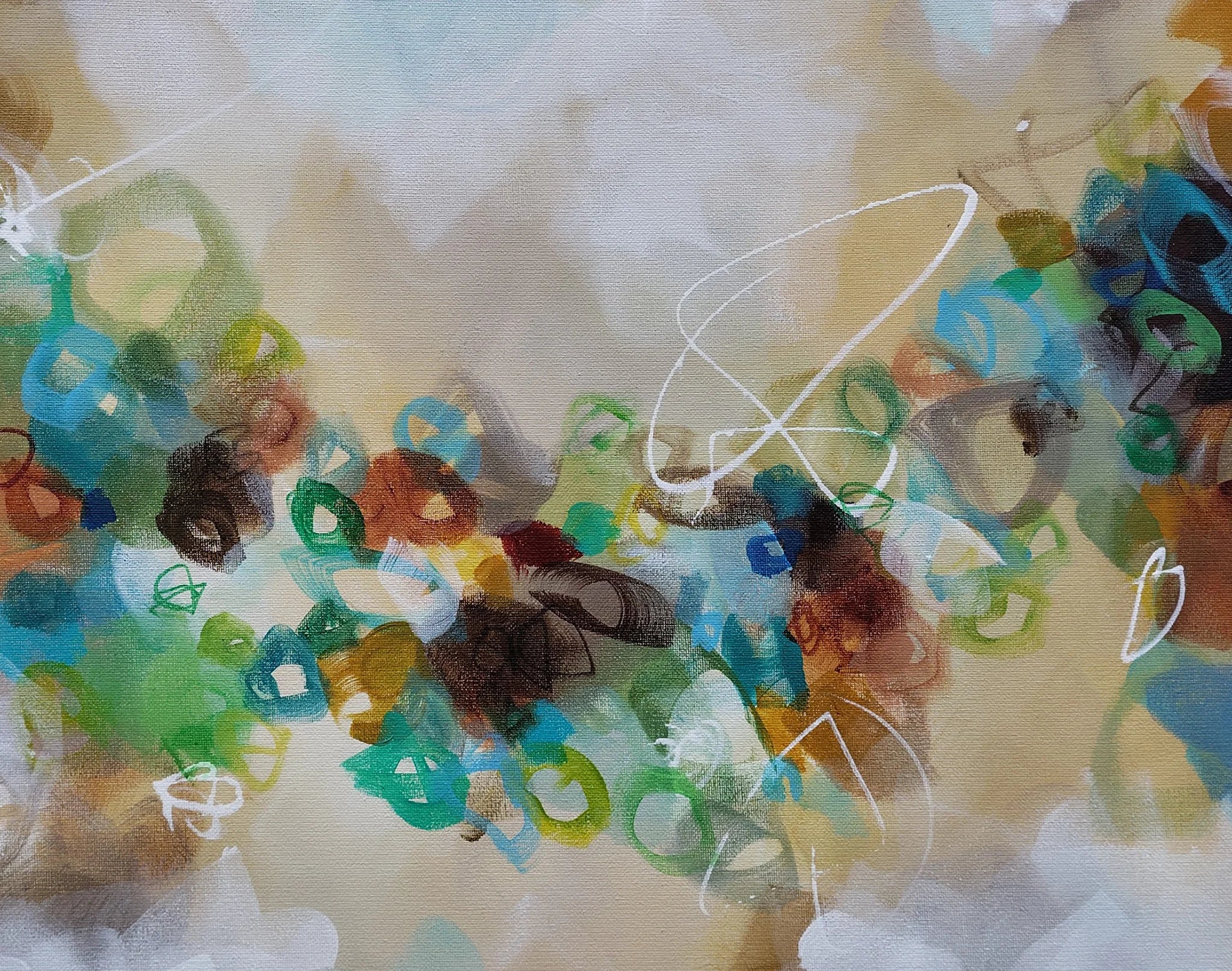 Abstract artwork with colorful shapes and patterns on a textured surface