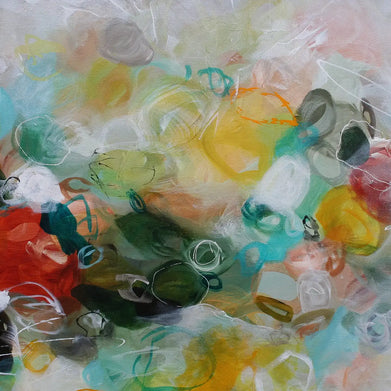 Abstract artwork with colorful glass beads on a white background