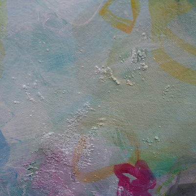 Abstract artwork with colorful brush strokes on a textured surface