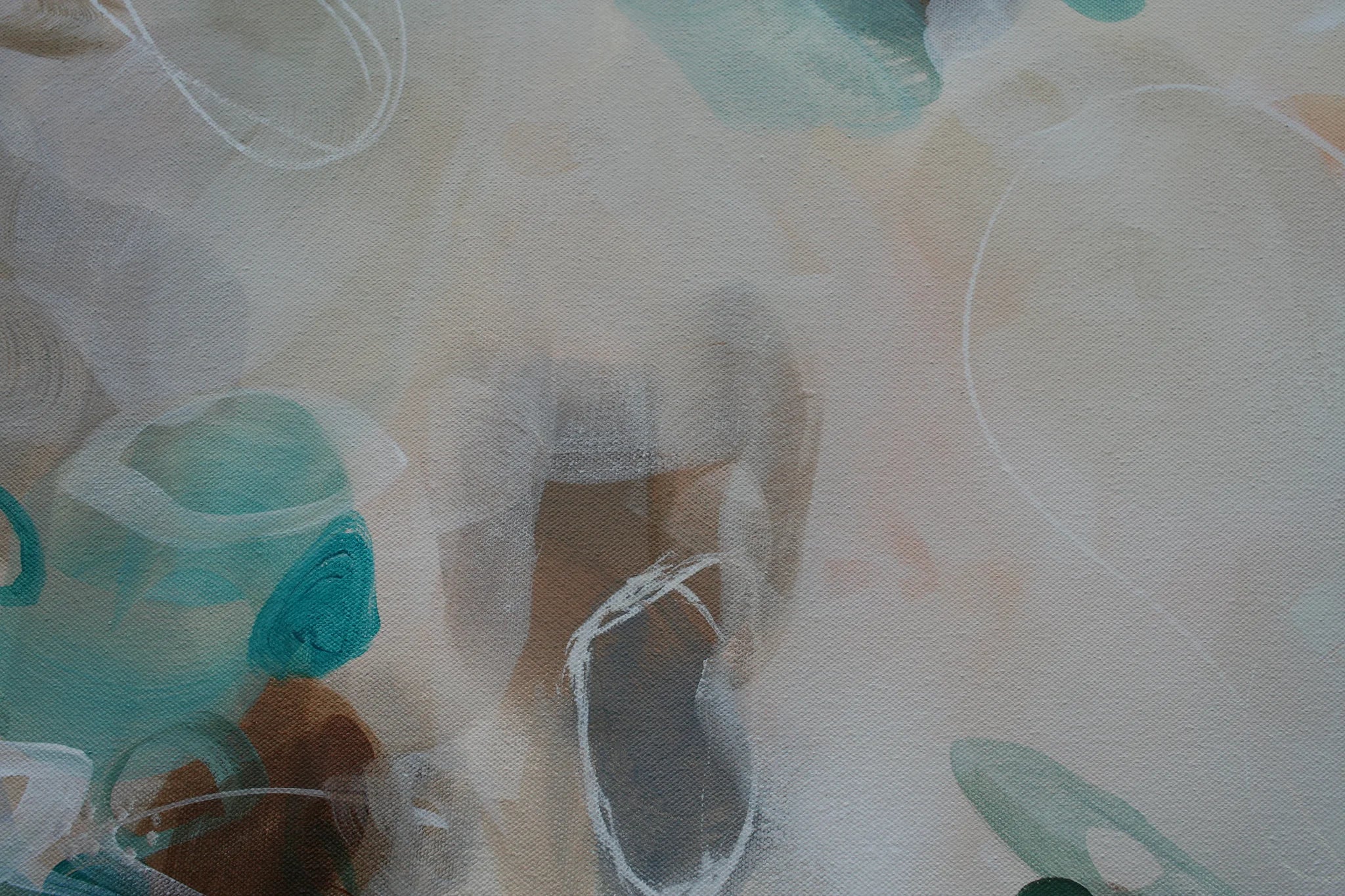 Abstract art with circular shapes in teal, brown, and beige on a textured beige background