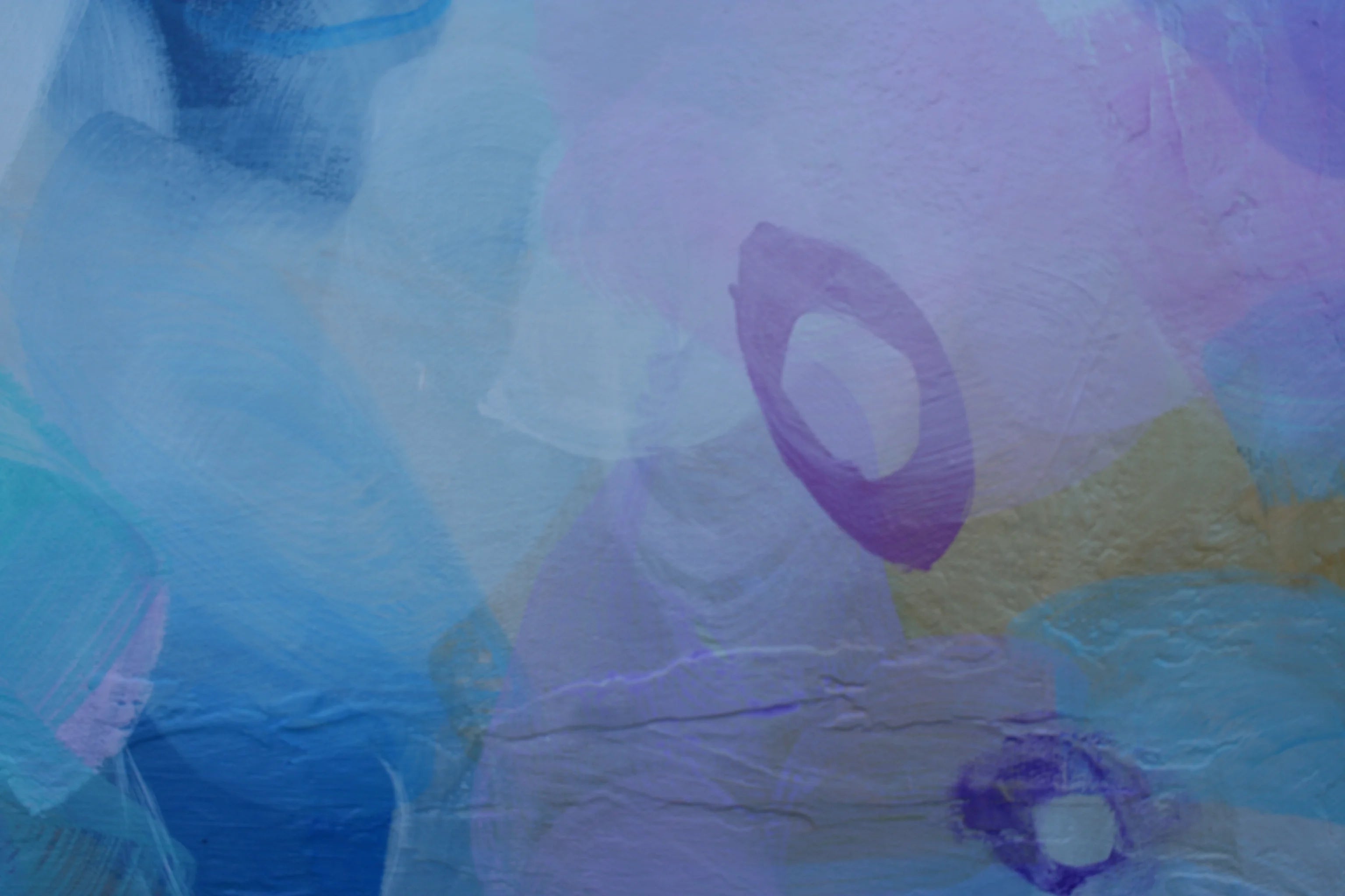 Abstract art with colorful shapes and patterns on a textured surface