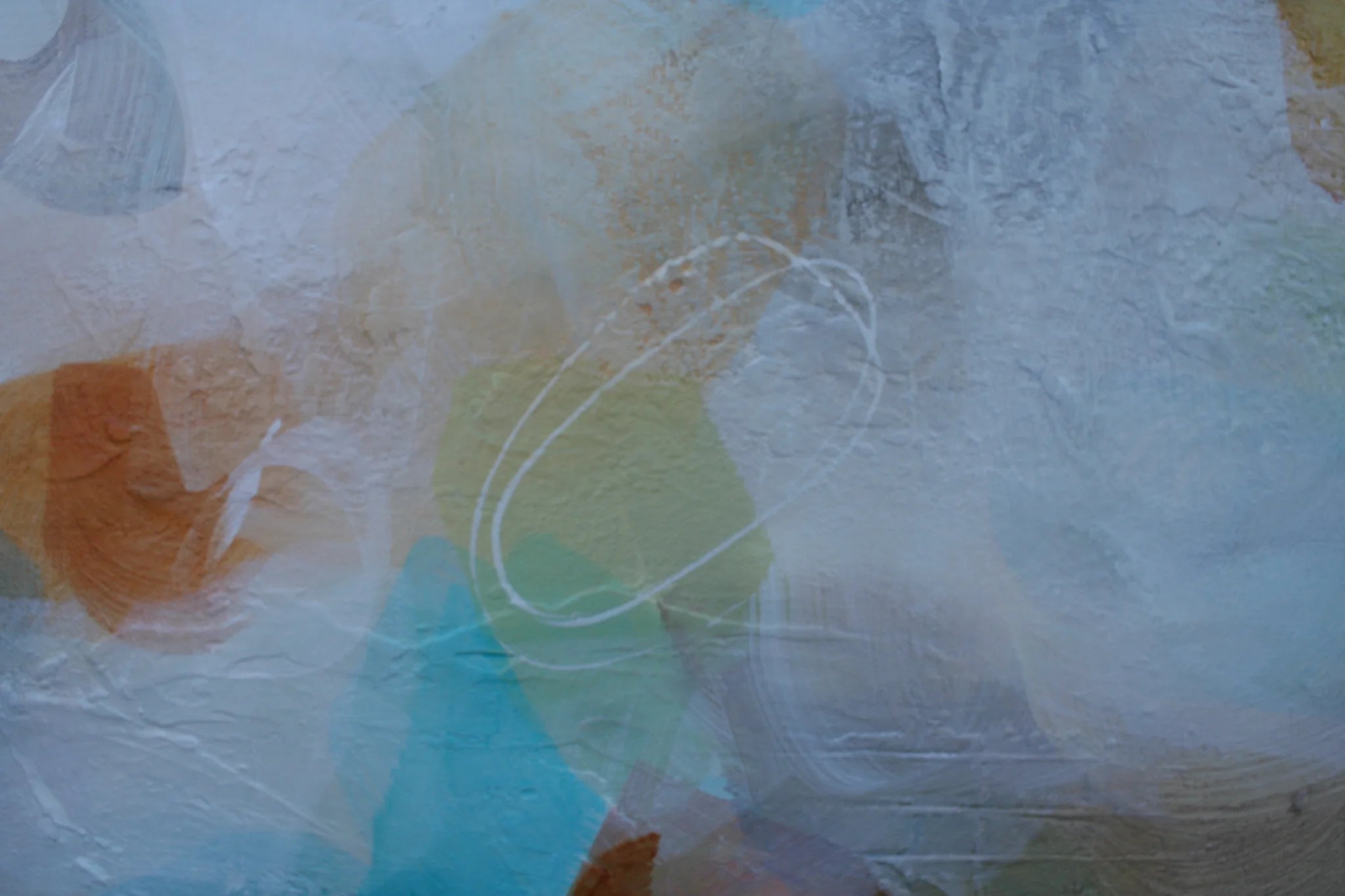 Abstract art with soft pastel colors on a textured surface