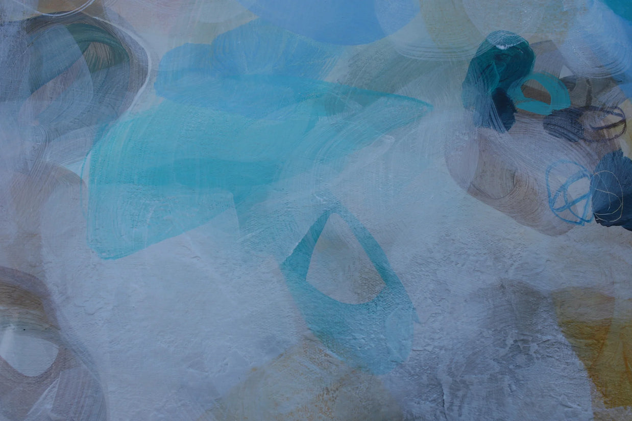 Clear plastic bags with blue handles on a textured surface