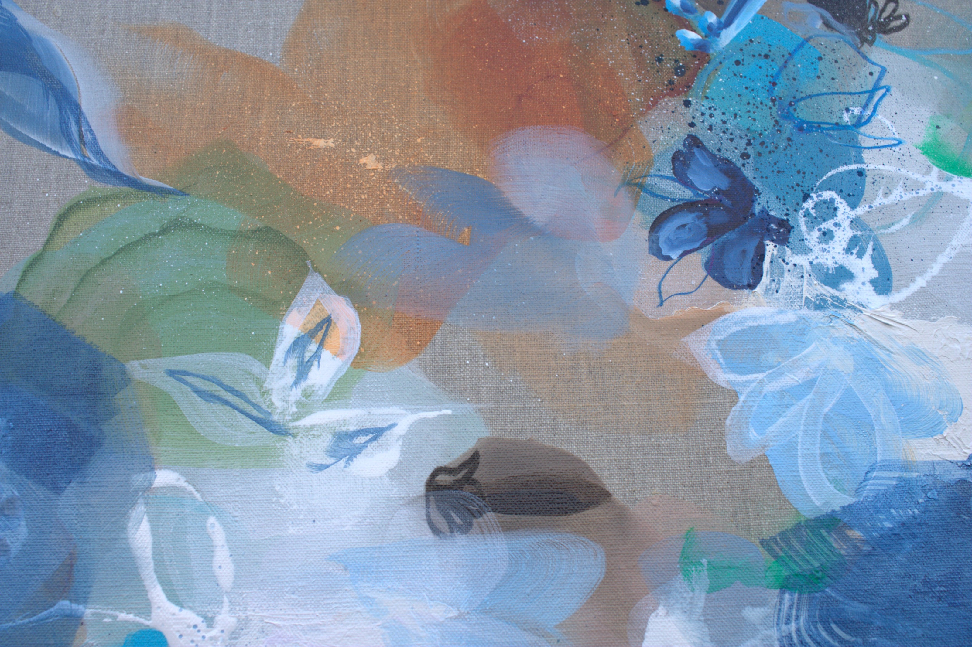Abstract artwork with blue, green, and orange colors on a textured surface.