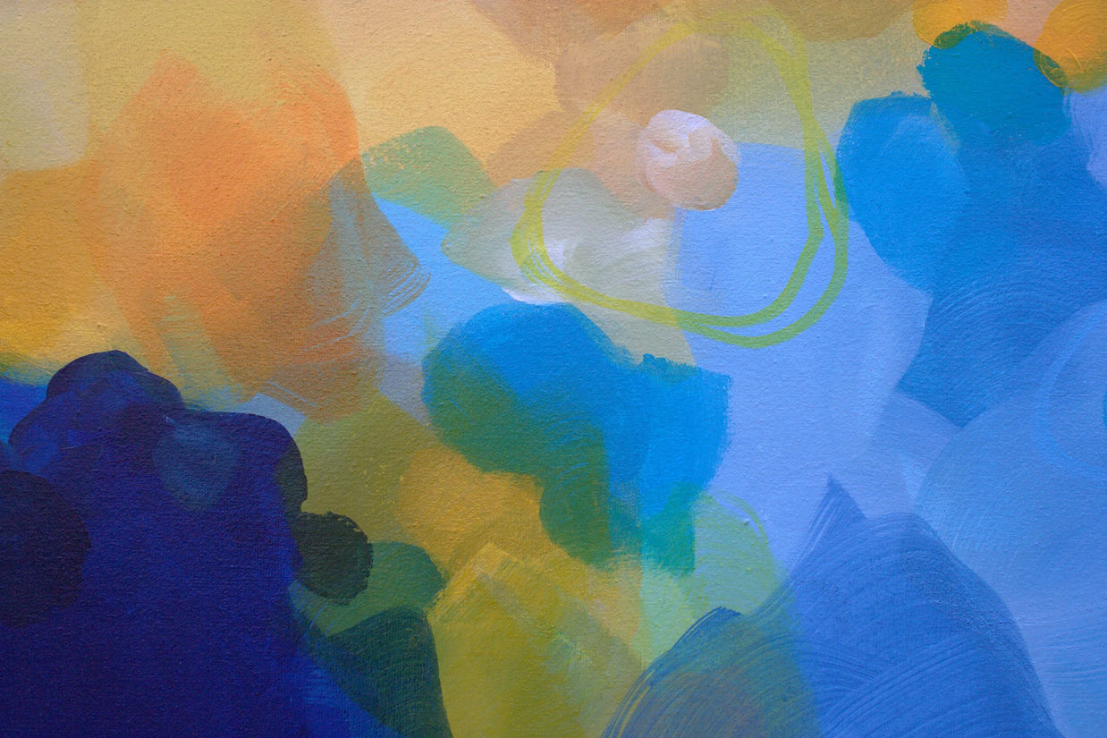 Abstract artwork with a mix of blue, yellow, and green colors.