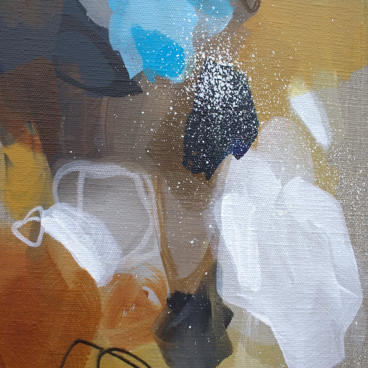 Abstract art with splashes of blue, black, white, and sienna on a linen canvas background
