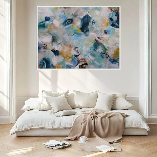 Bedroom with a large abstract painting above a bed
