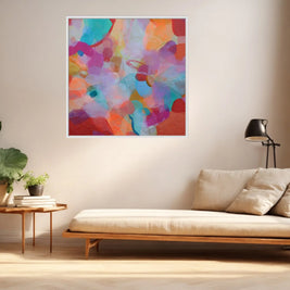 Living room with a colorful abstract painting on the wall, beige sofa, and small table with plants.