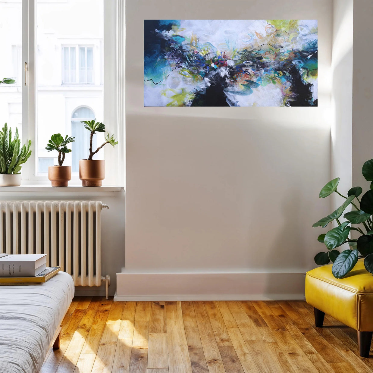 Living room with abstract painting on the wall, plants, and a yellow chair.