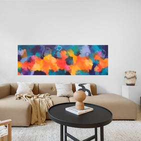 Colourful abstract painting above sofa
