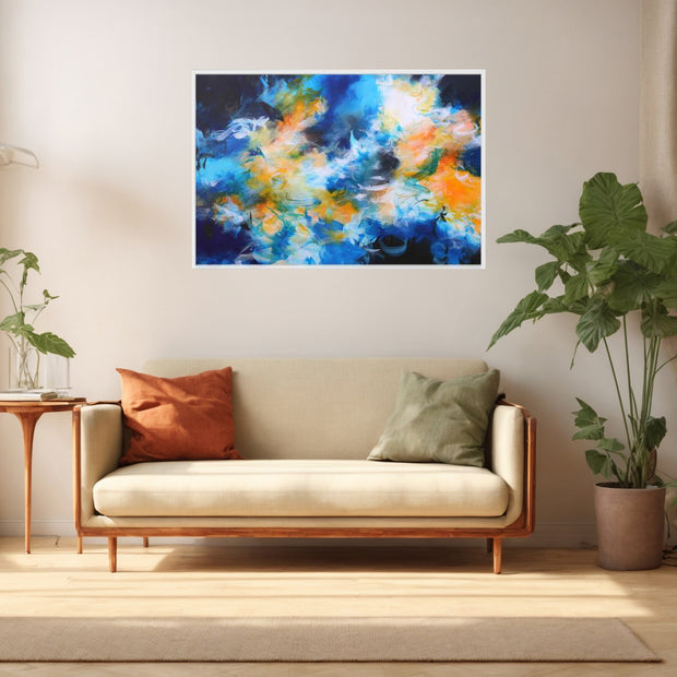 Blue orange and white framed abstract canvas print above sofa in lounge with large leafy plant
