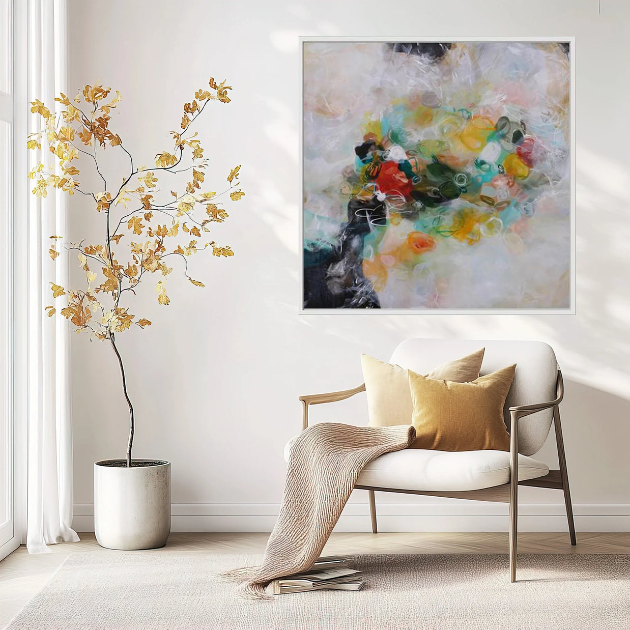 Modern living room with a white armchair, abstract painting, and decorative plant.