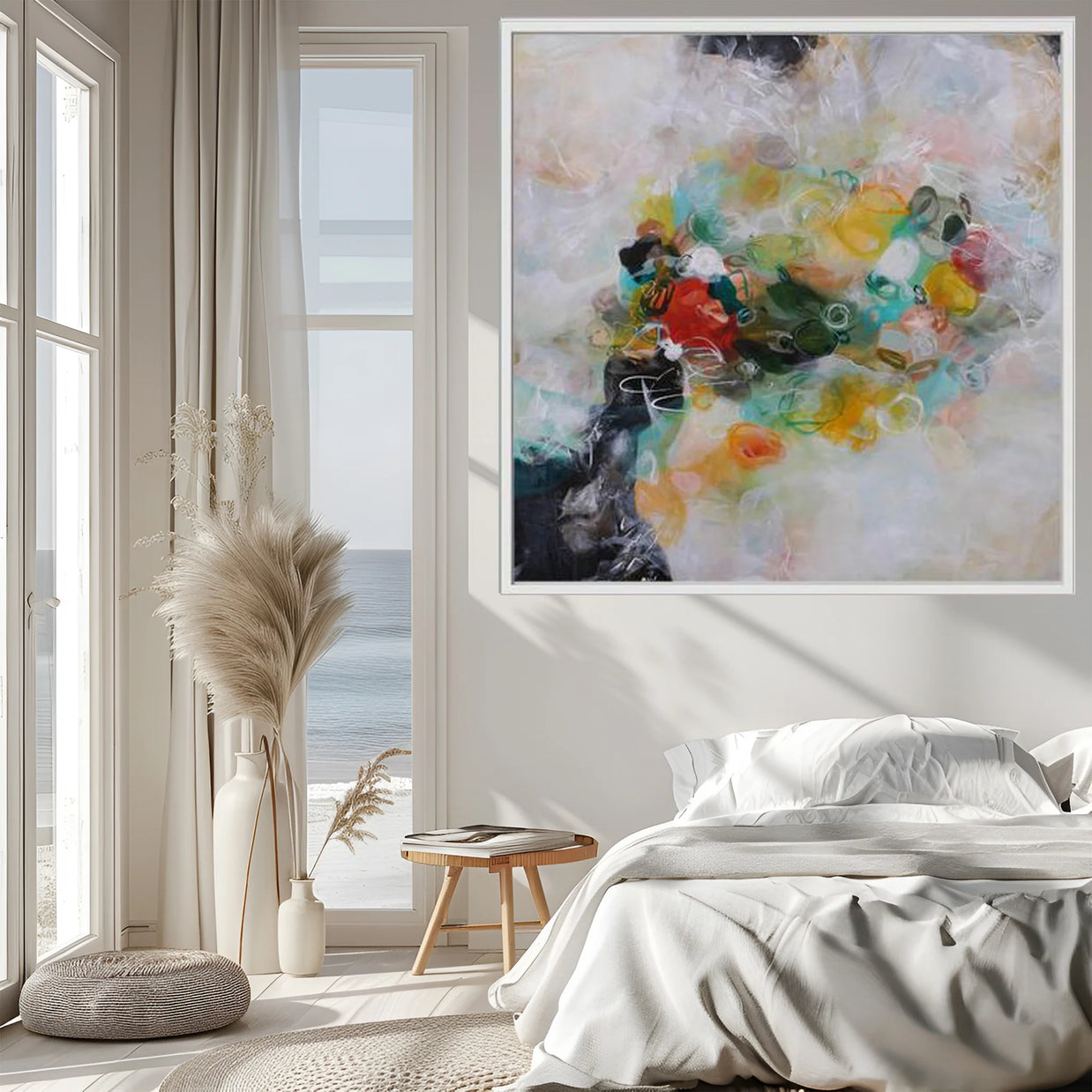 Modern bedroom with abstract art on the wall, large windows, and decorative elements.