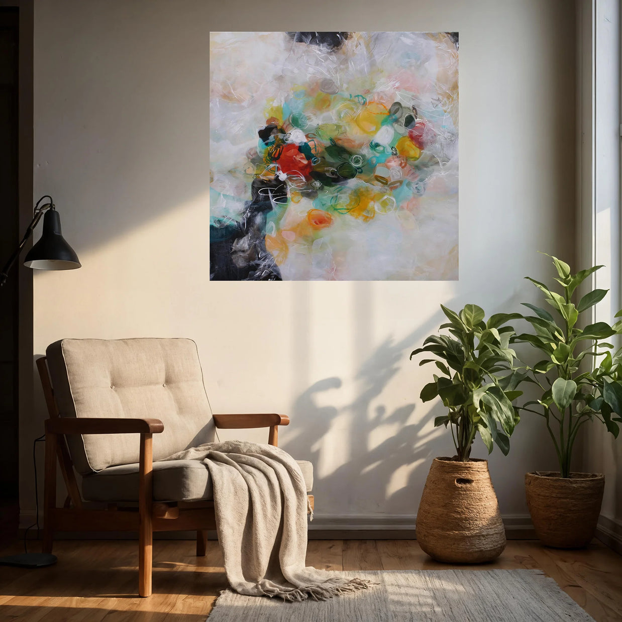 Living room with a colorful abstract painting, armchair, and plants.