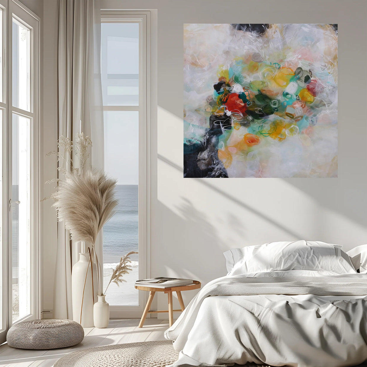Modern bedroom with abstract art on the wall, large windows, and decorative elements.