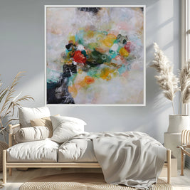 Modern bedroom with a colorful abstract painting on the wall, a bed with white bedding, and decorative elements.