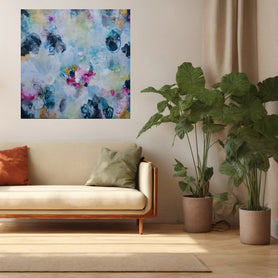 Floral inspired colourful abstract art hanging above sofa