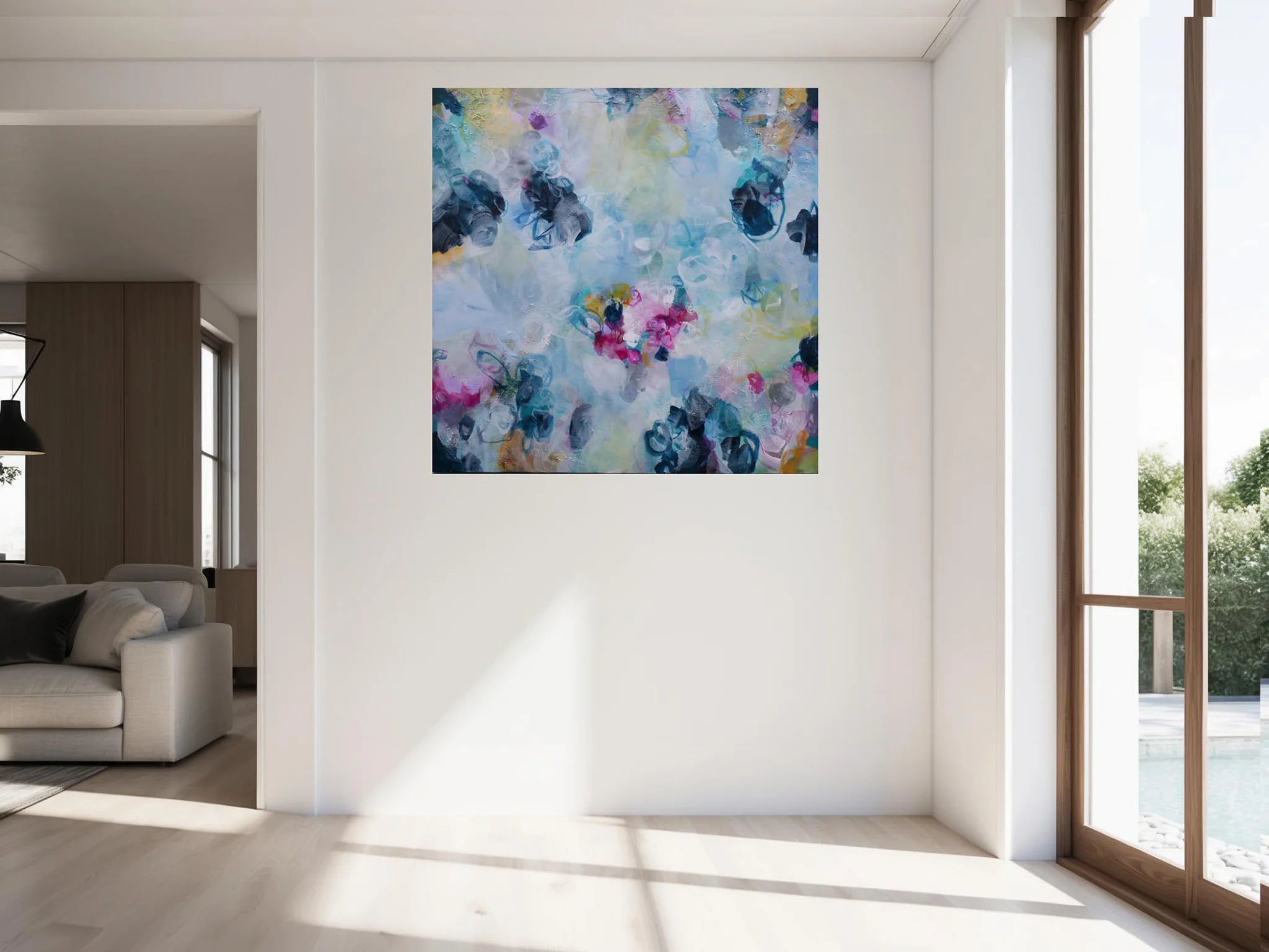 Colorful abstract painting on a white wall in a modern living room.