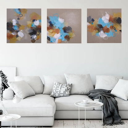 Three side-by-side images of colorful abstract art on a linen canvas background above sofa