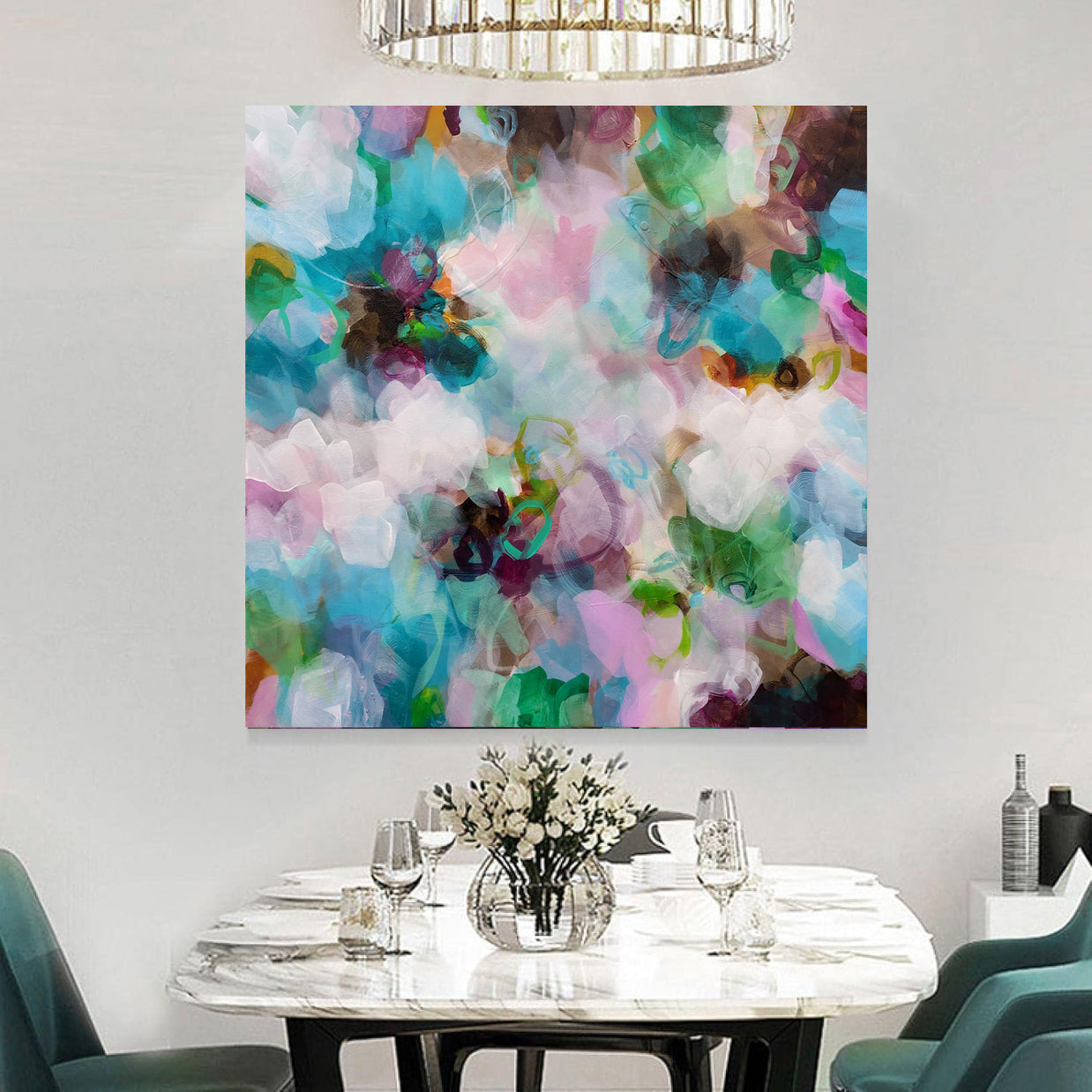 Dining room with a colorful abstract painting on the wall above a table set for four.