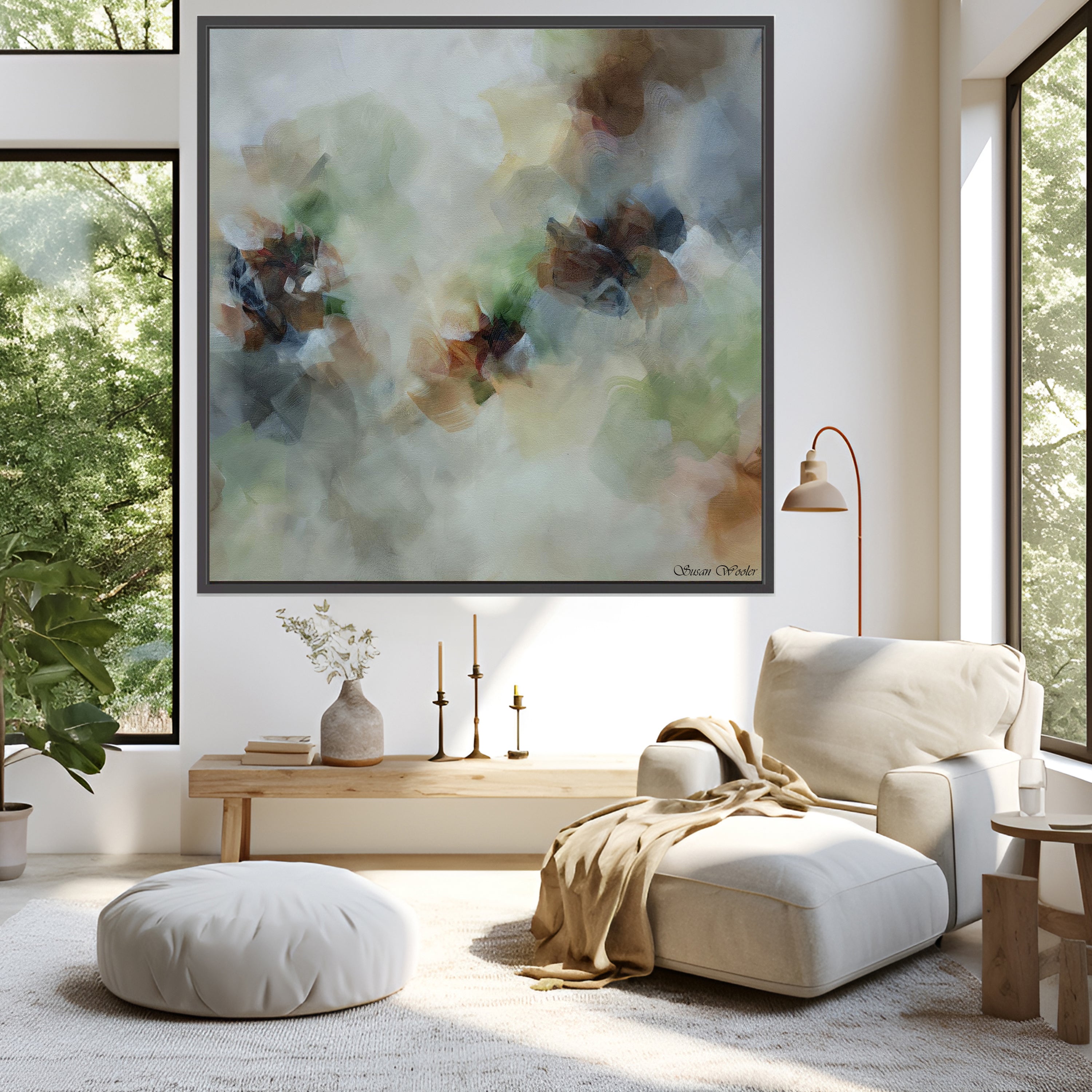 Modern living room with a large abstract painting, white armchair, and wooden coffee table.