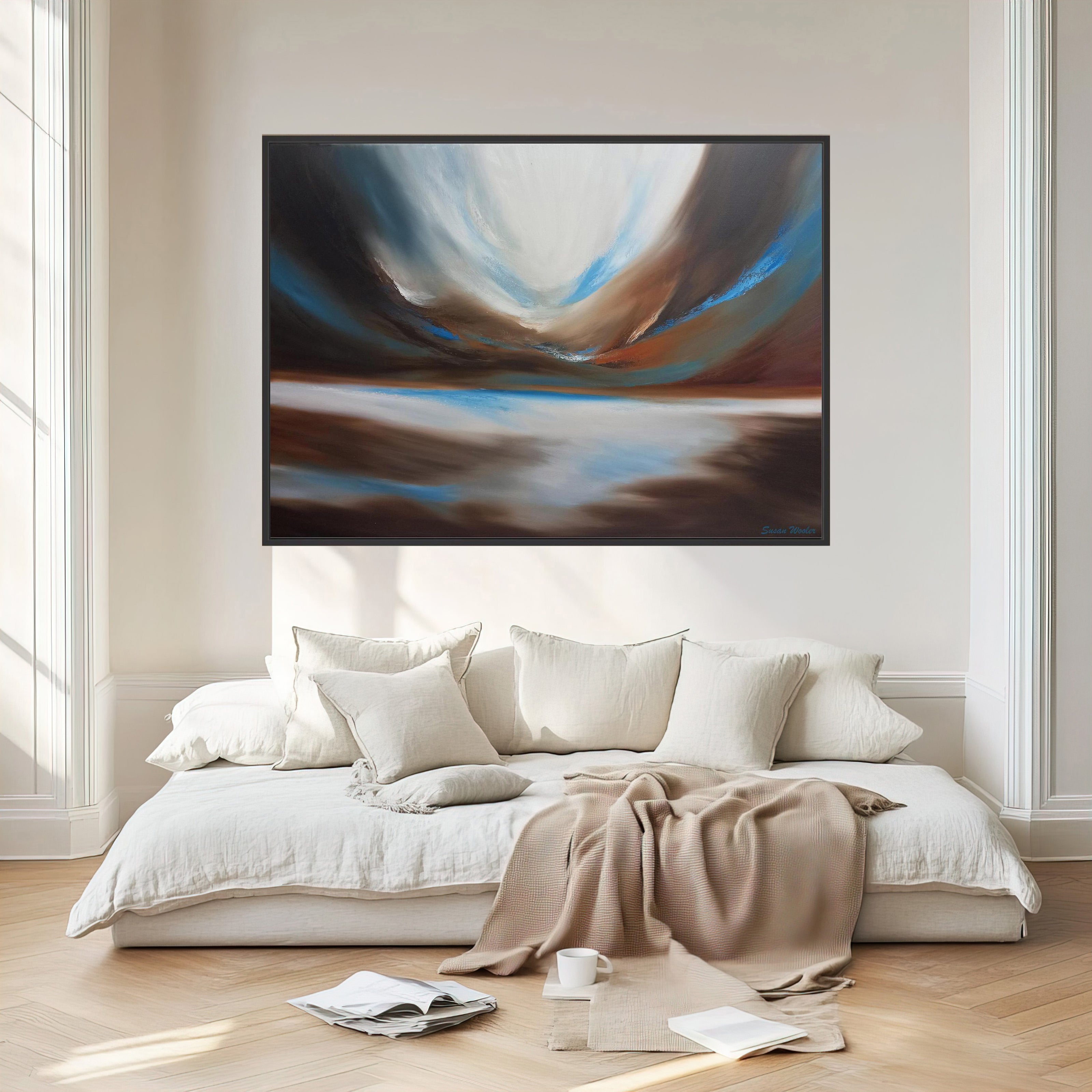 Modern bedroom with a large abstract painting above a bed.