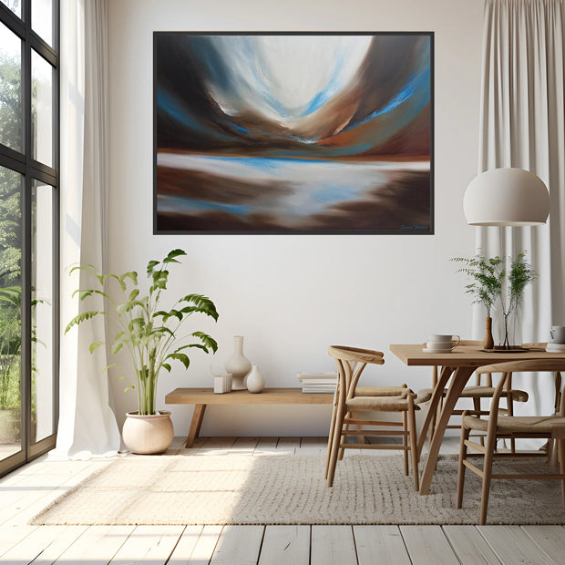 Modern dining room with abstract art on the wall, wooden table, and chairs.