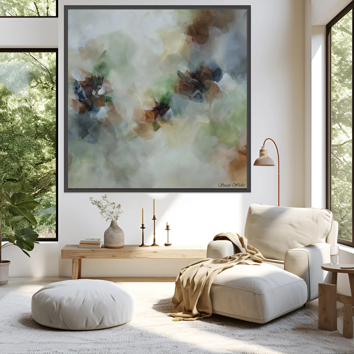 Modern living room with a large abstract painting, white armchair, and wooden coffee table.