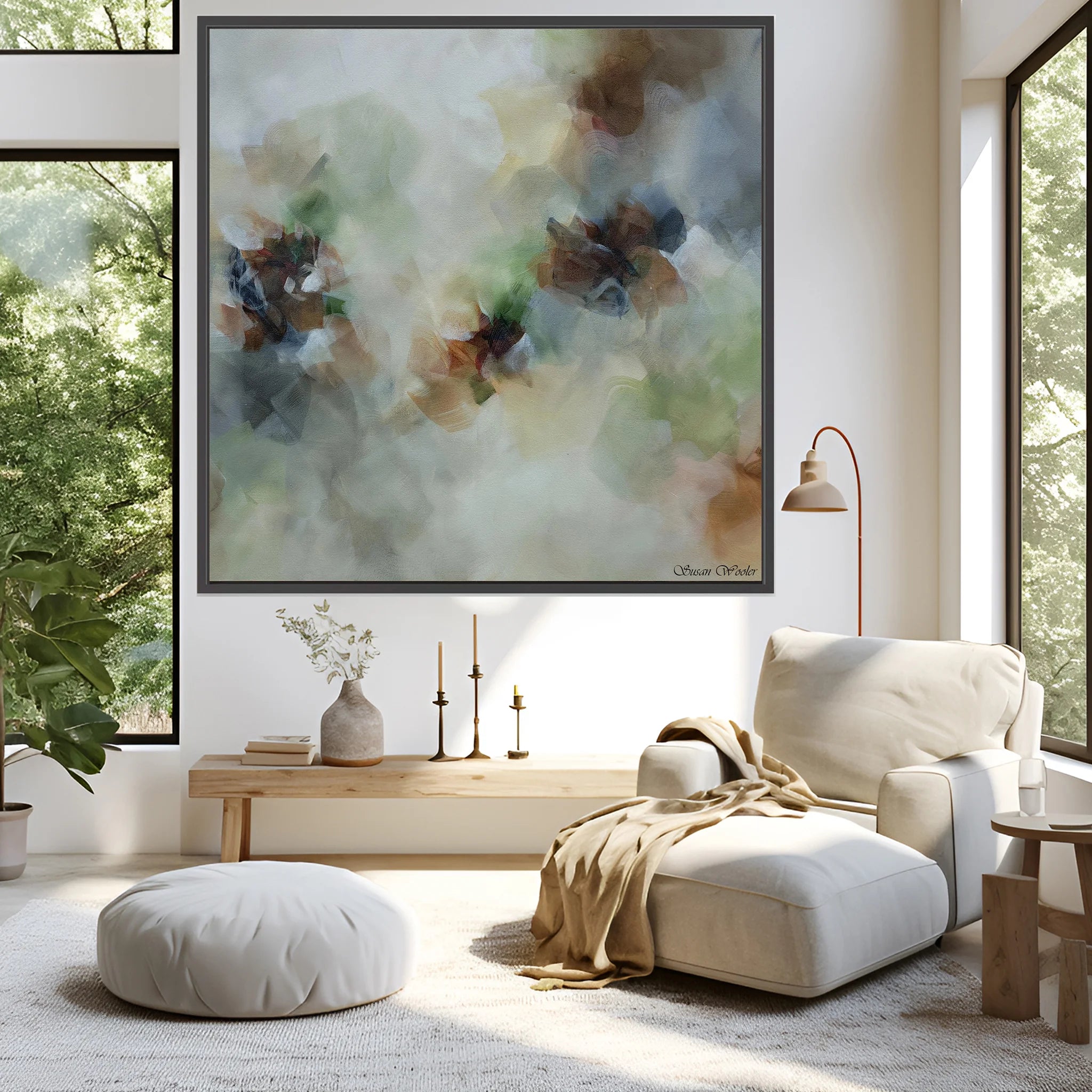 Modern living room with a large abstract painting, white armchair, and wooden coffee table.