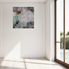 Abstract painting on a white wall with a large window in the background