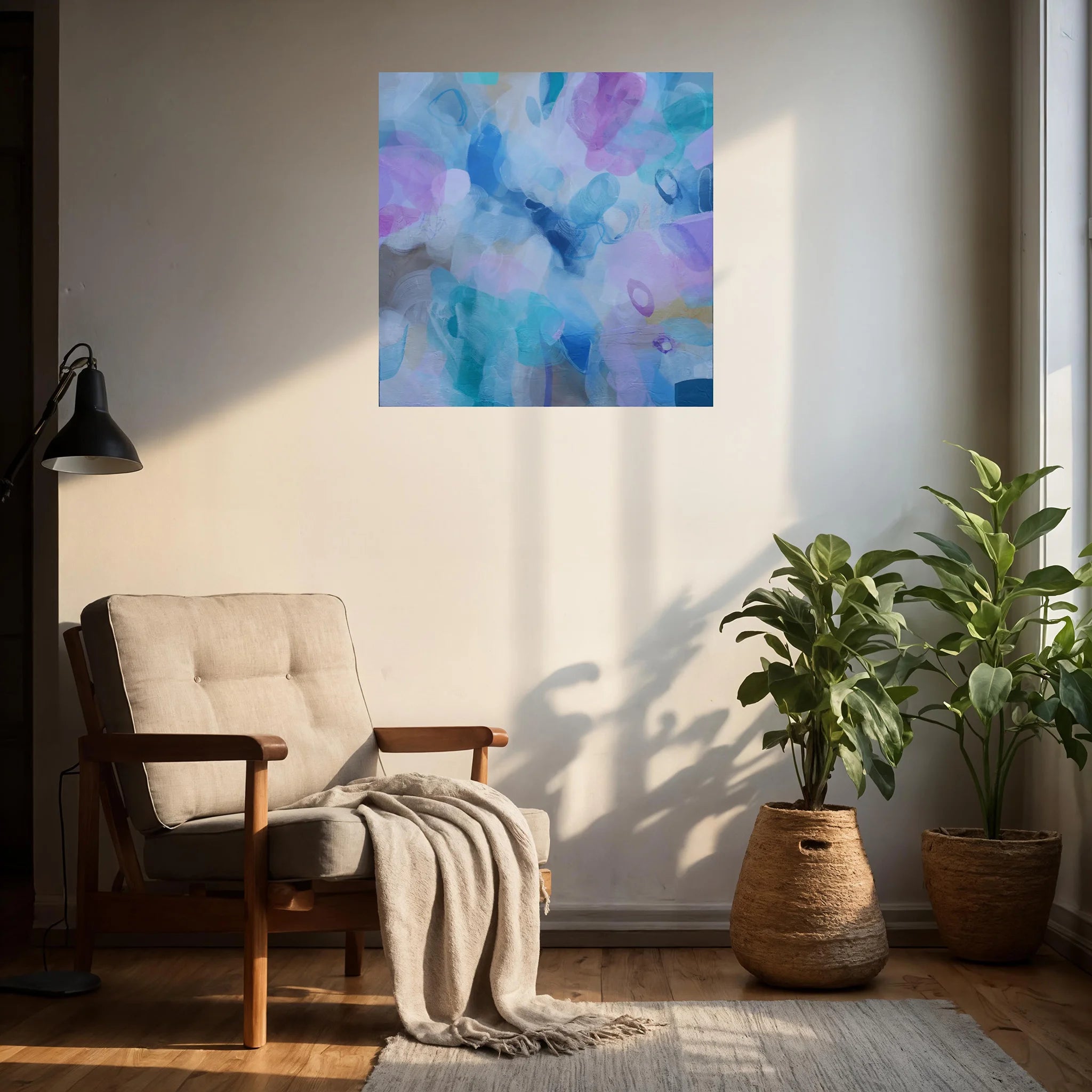 Living room with a chair, plants, and a colorful abstract painting on the wall.