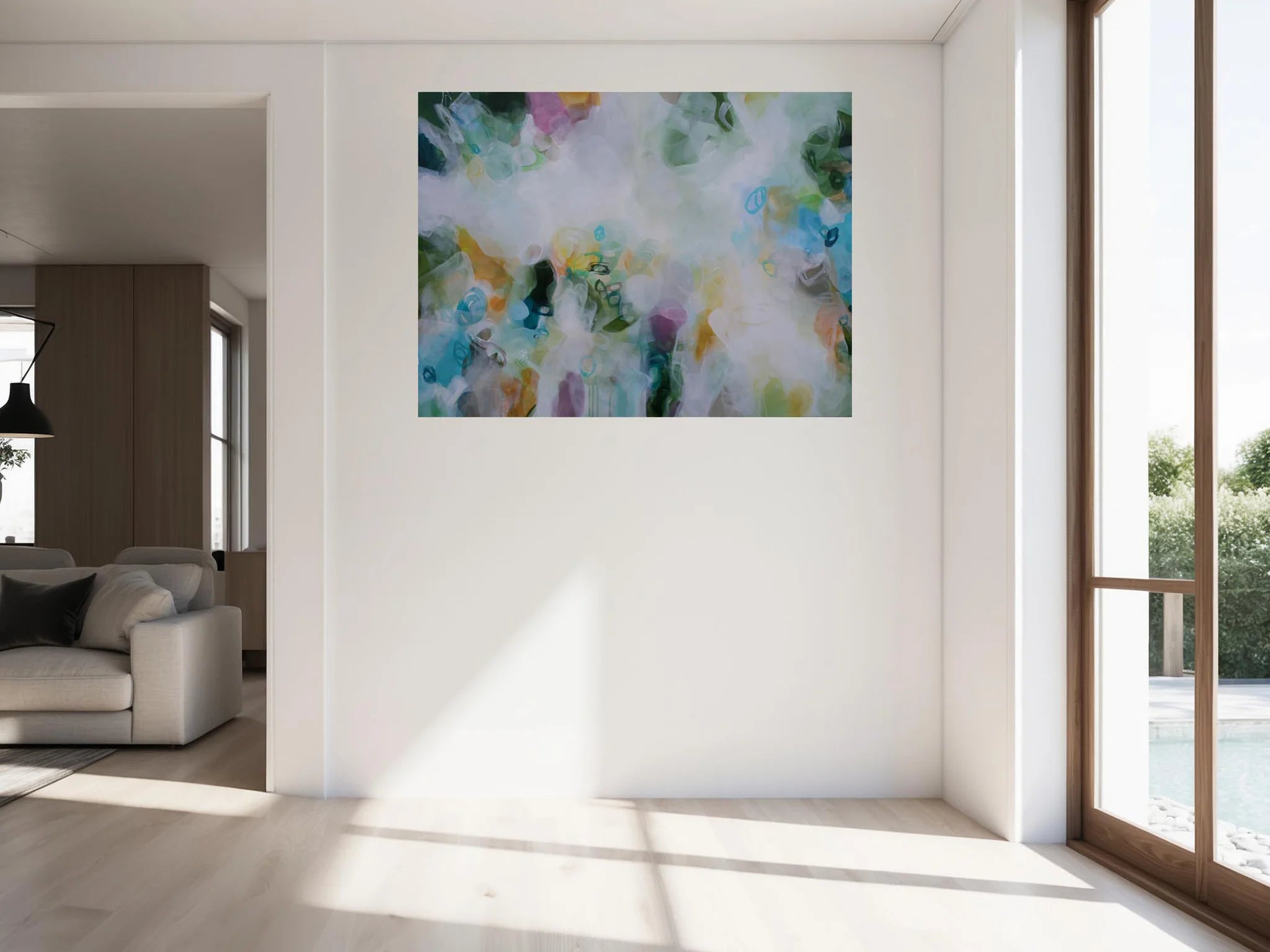 Abstract painting on a wall in a bright living room