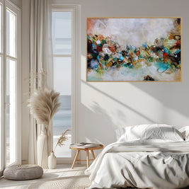 Modern bedroom with abstract art on the wall, large windows, and decorative elements.