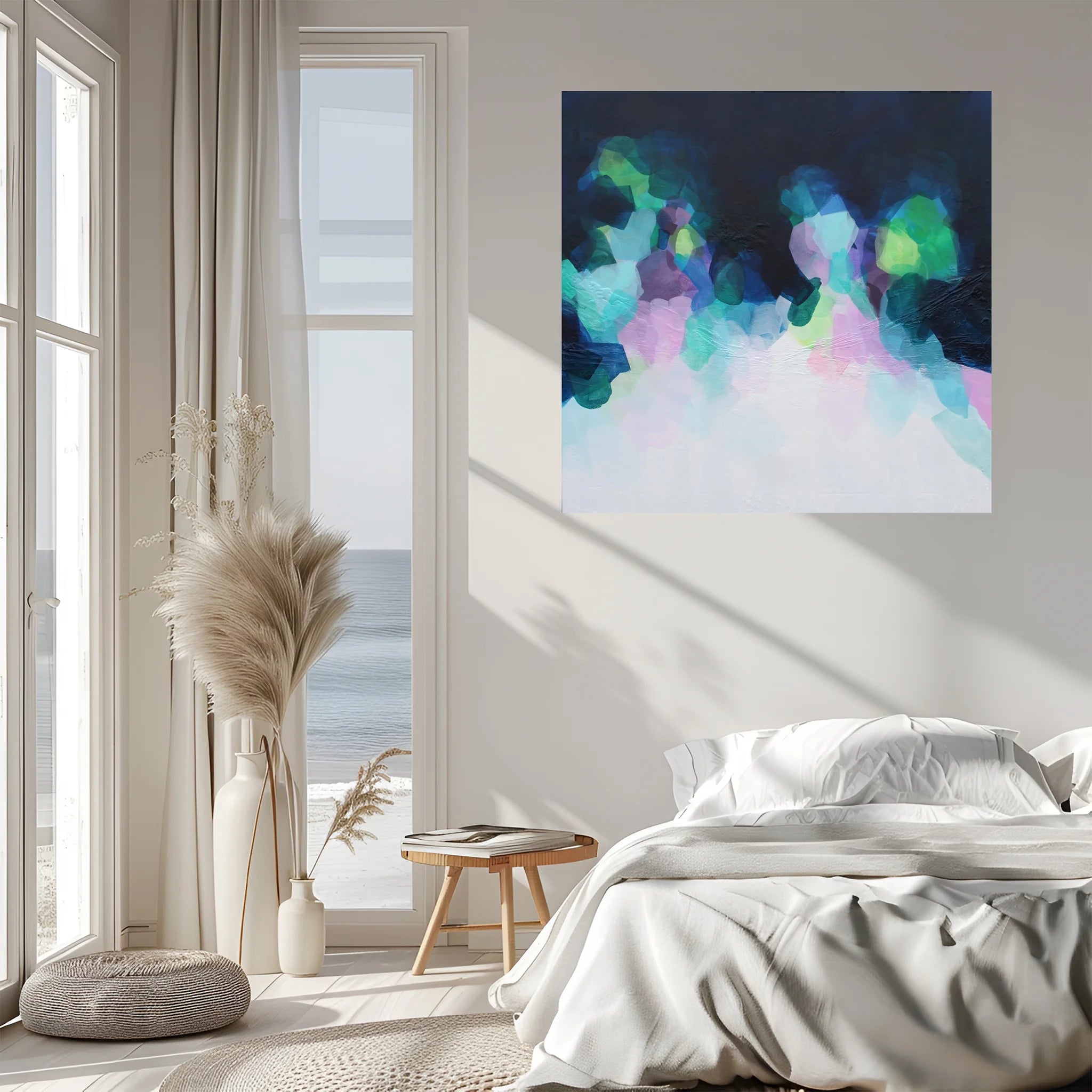 Modern bedroom with a colorful abstract painting on the wall, large windows, and natural light.