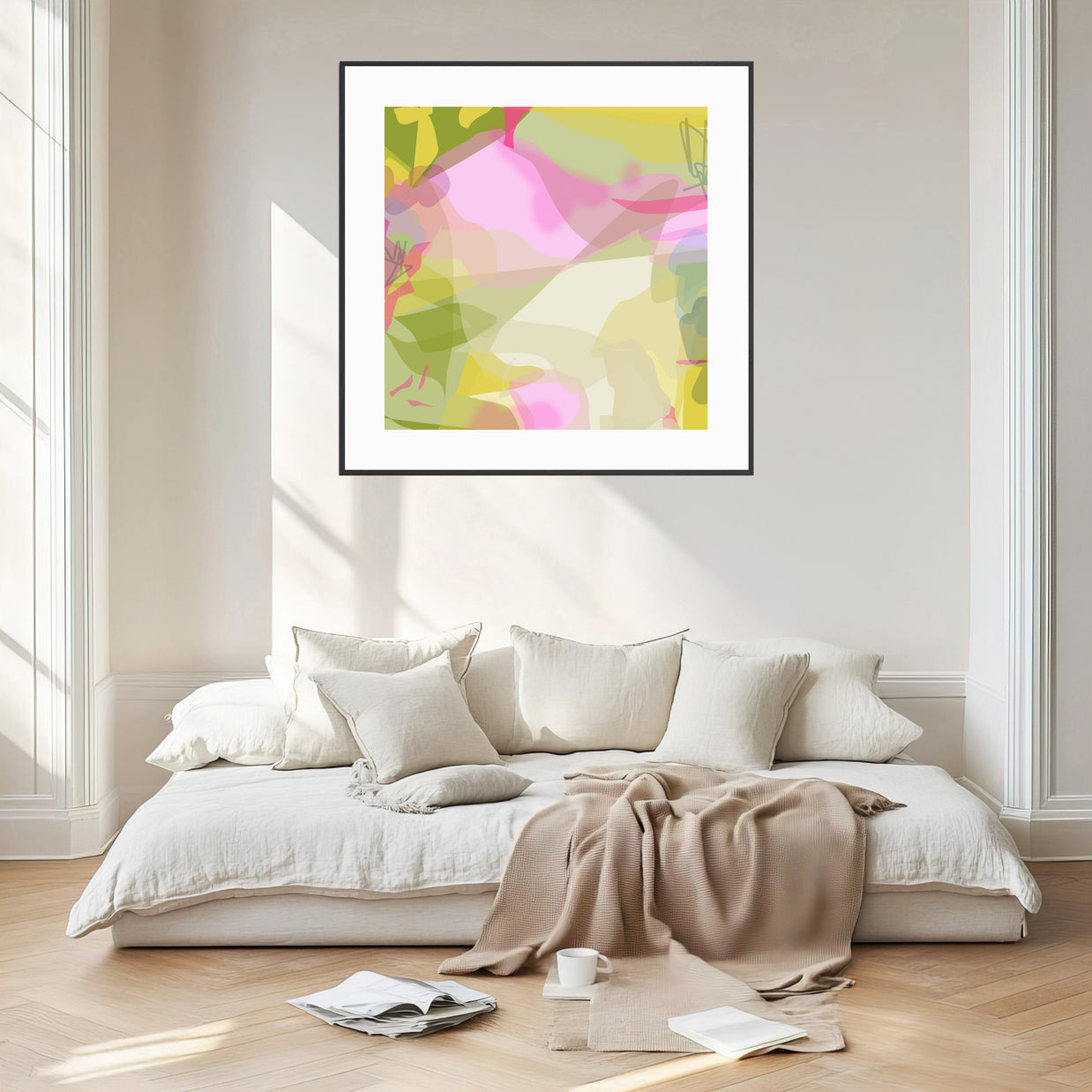 Modern bedroom with a bed, abstract art on the wall, and a cup on a side table.