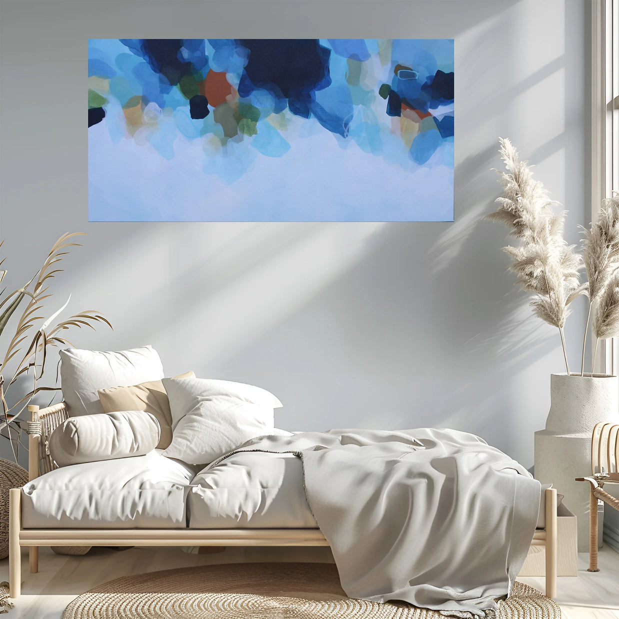 Modern bedroom with a bed, abstract wall art, and decorative plants.