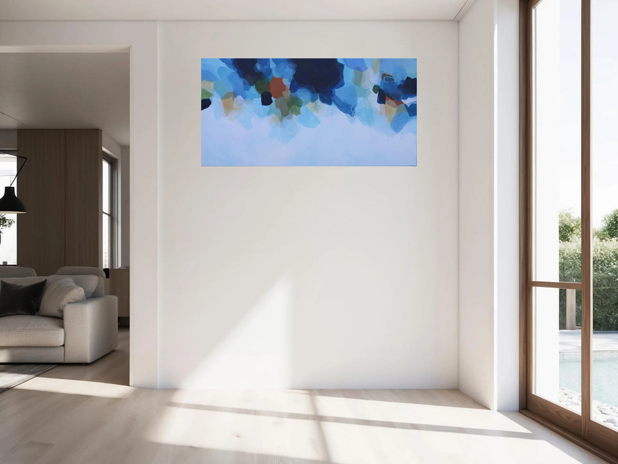 Abstract painting on a wall in a modern living room