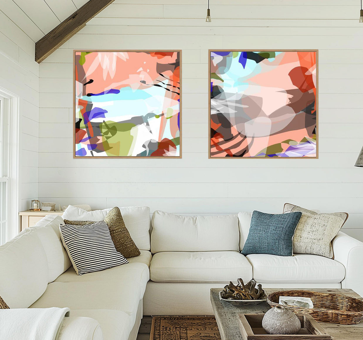 Living room with a white sofa, abstract art on the wall, and decorative items.