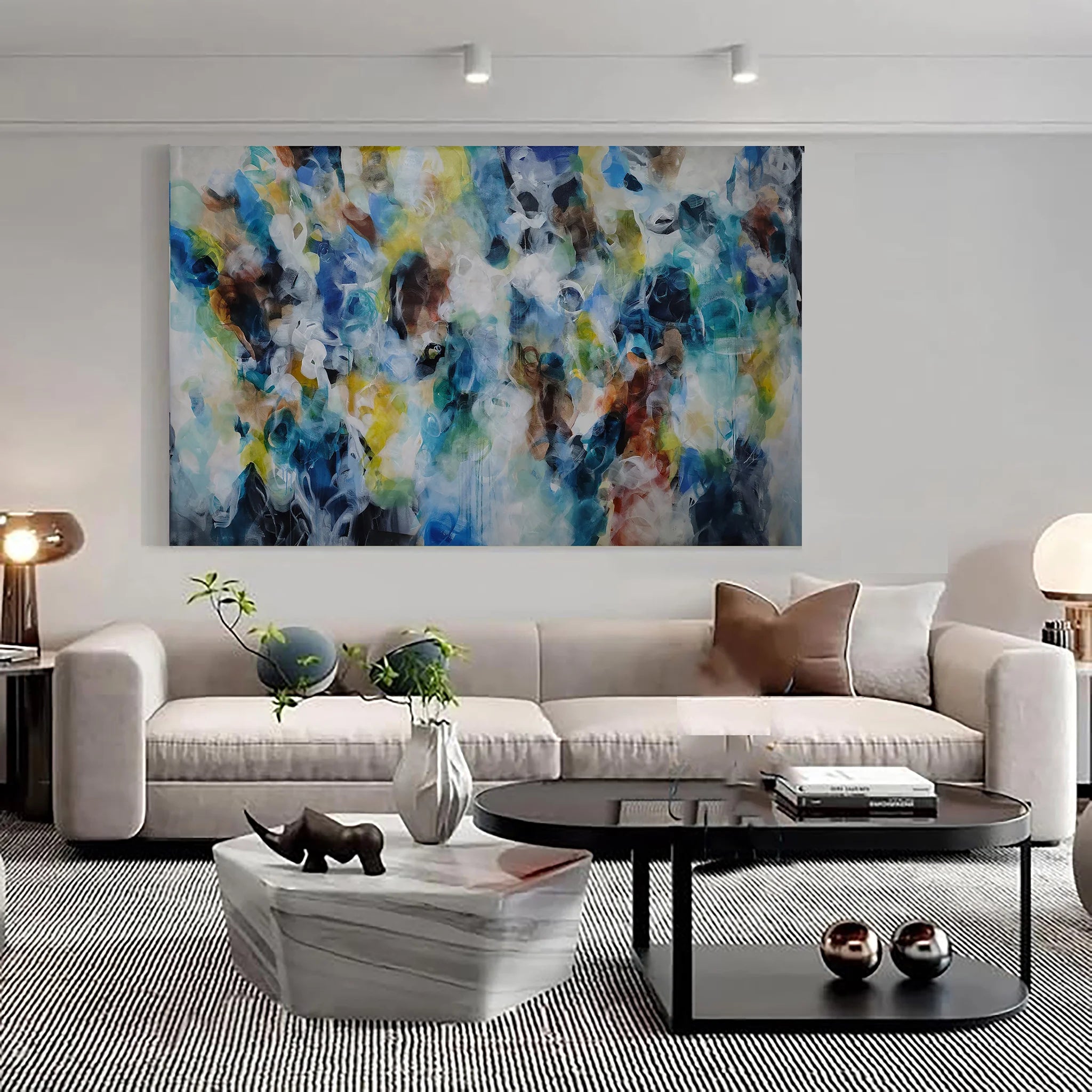 Modern living room with a colorful abstract painting above a sofa.